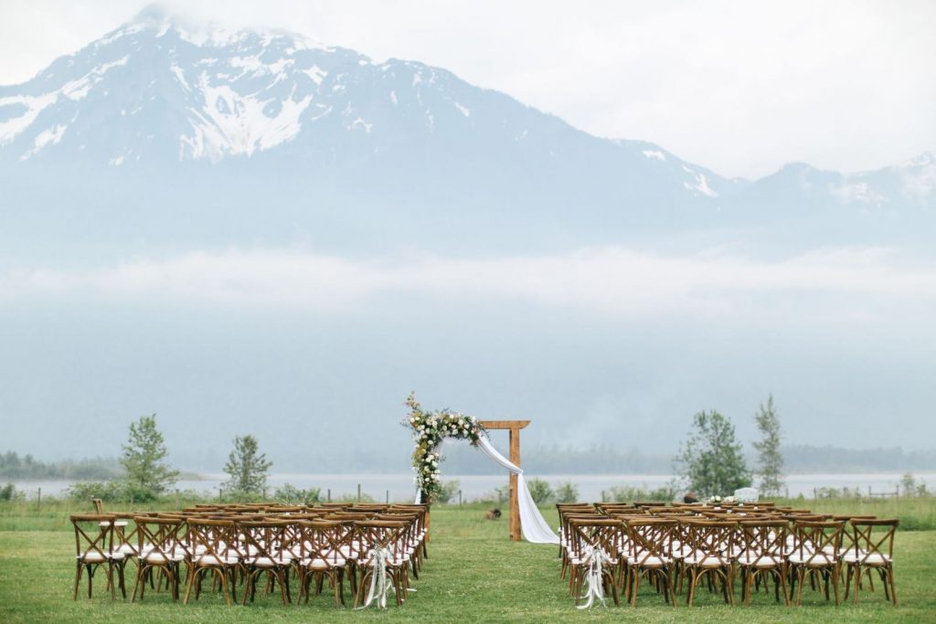 outdoor wedding with mountains in the background
